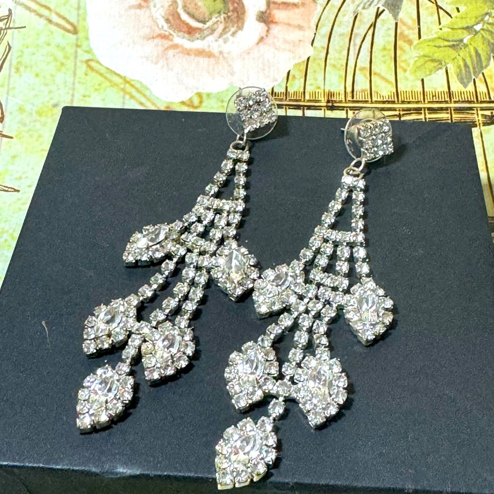 Absolutely stunning shiny Silver toned CZ shiny beautiful quality drop earrings.